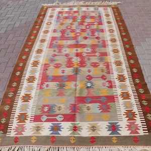 Large Vintage Kilim Rug: 1960s Turkish Wool Bohemian Carpet (5.4 x 9.4 ft)