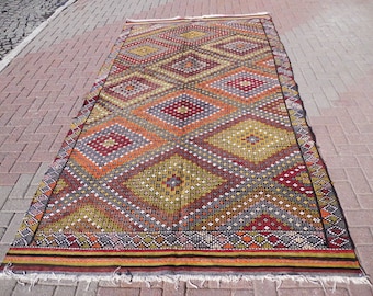 Vintage Handwoven Wool Kilim Rug: Turkish Anatolian Design (68” x 122”)
