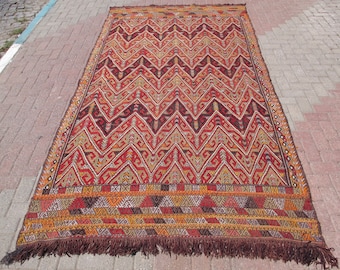 Vintage Handwoven Wool Kilim Rug: Large Boho Area Carpet (5’7” x 10’6”)