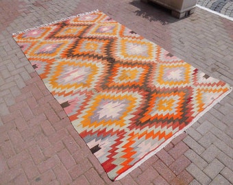 Vintage Turkish Kilim Rug: Handwoven Wool Geometric Area Rug (69" x 112")