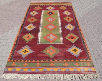 Handwoven Wool Kilim Rug: Vintage Tribal Design, 5.7 x 10.2 ft