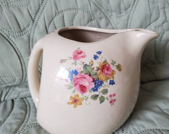 Vintage flowered water pitcher or farmhouse milk pitcher. Ceramic water pitcher