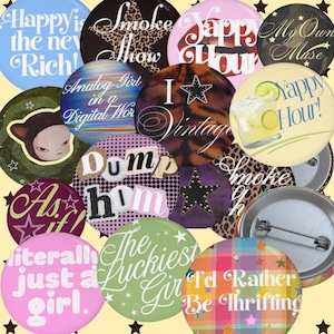 May include: A collection of circular pin-back buttons featuring various designs, including text like Happy is the new Rich, Smoke Show, Yappy Hour, My Own Muse, Analog Girl in a Digital World, I Vintage, Dump him, As if, literally just a girl, and I'd Rather Be Thrifting.