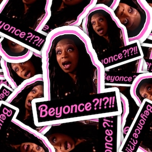 May include: A set of pink and black stickers with the text "Beyonce?!?!!" and a picture of a woman with a surprised expression.