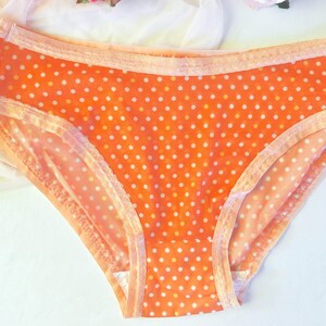 See through mesh polka-dots bikini panties.