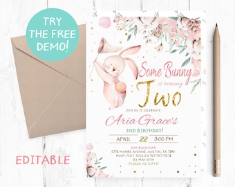May include: A pink and gold birthday invitation with a watercolor illustration of a bunny holding a butterfly net. The text reads "Some Bunny is turning Two" and "Aria Grace's 2nd Birthday!" with the date and time of the party. The invitation also includes the address and RSVP information.
