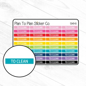 May include: A sheet of colorful "To Clean" stickers with a rainbow color scheme. The stickers are arranged in a grid pattern and are labeled with the text "To Clean" in white. The sheet is labeled "Plan To Plan Sticker Co." and "1349-8".