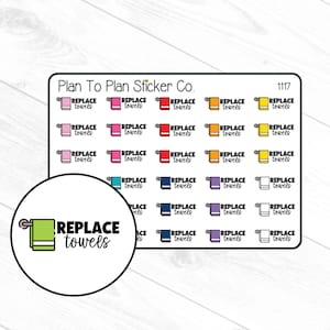 May include: A sheet of stickers from Plan To Plan Sticker Co. featuring the text "REPLACE towels" with a towel graphic. The stickers are in various colors, including pink, red, orange, and blue. The number 1117 is in the upper right corner.