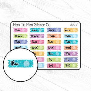 May include: A sheet of colorful planner stickers with days of the week labeled. The stickers are decorated with white polka dots and have a pastel color scheme. The stickers are labeled "Sun", "Mon", "Tues", "Wed", "Thu", "Fri", and "Sat".