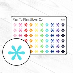May include: A sheet of colorful star stickers with the text "Plan To Plan Sticker Co." and "1528" in the top corners. The stickers are in shades of pink, red, orange, yellow, green, blue, purple, and black.