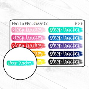May include: A sheet of colorful stickers with the text "sleep tracker" in white lettering. The stickers are in various shades of pink, red, orange, yellow, green, blue, purple, and black. The stickers are designed for use in a planner or journal.