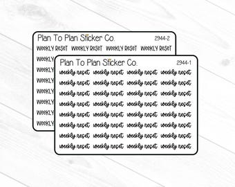 May include: Two sticker sheets with the text "Plan To Plan Sticker Co." and "WEEKLY RESET" in black. The stickers are rectangular with rounded corners and a white background. The text "weekly reset" is repeated multiple times.