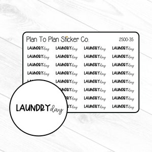 May include: A sheet of stickers with the text "LAUNDRY day" repeated multiple times. The stickers are white with black text and are designed for use in a planner or journal.