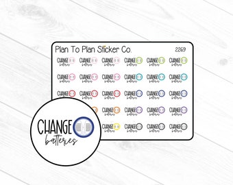 May include: A sheet of stickers with the text "Change batteries" and a variety of colored battery icons. The stickers are designed for use in a planner or journal.
