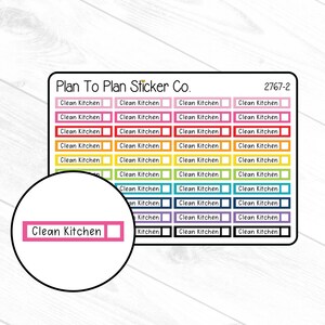 May include: A sheet of colorful stickers with the text "Clean Kitchen" repeated multiple times. The stickers are arranged in rows and columns, with each row featuring a different color. The stickers are designed for use in a planner or journal.