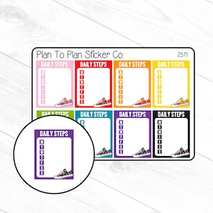 May include: A set of eight colorful daily steps planner stickers with a sneaker graphic. Each sticker has a different color and a space to write in the days of the week. The stickers are labeled "Daily Steps" and have the number "2511" printed on one of the stickers.