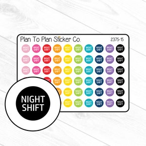 May include: A sheet of colorful round stickers with the text "NIGHT SHIFT" in white lettering. The stickers are arranged in a rainbow pattern with a black circle in the center of the sheet.
