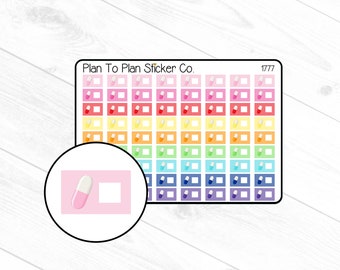 May include: A sheet of colorful pill-shaped stickers with a white border. The stickers are arranged in rows and columns. The sheet is labeled "Plan To Plan Sticker Co." and "1777".