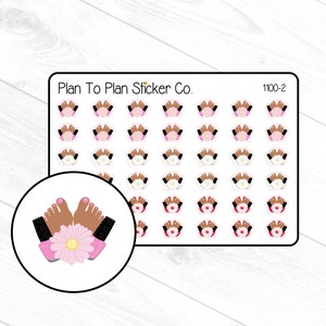 May include: A sheet of stickers featuring a design of two bare feet with pink toenails and black ankle bracelets, wearing pink sandals with a white flower in the middle. The sheet is labeled "Plan To Plan Sticker Co." and "1100-2".