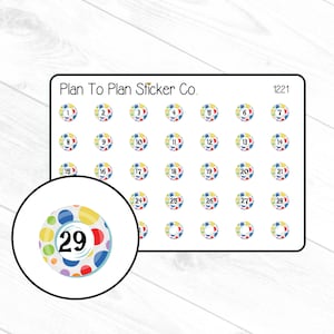 May include: A sheet of 29 colorful round stickers with numbers 1 through 29. Each sticker features a white background with a colorful ring around the edge and a number in the center. The stickers are arranged in a grid pattern on a white background. The text "Plan To Plan Sticker Co." and "1221" are printed at the top of the sheet.