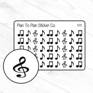 May include: Sheet of stickers featuring black musical notes and treble clef symbols. The stickers are from Plan To Plan Sticker Co. and include the number 1372. A circular sticker with a treble clef is also included.