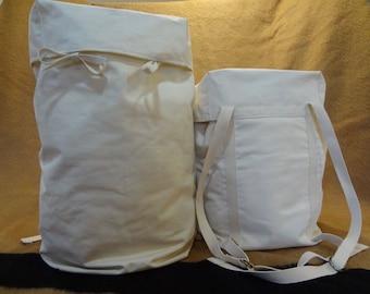 Small Canvas backpack with attached lid and inner dbl pocket.