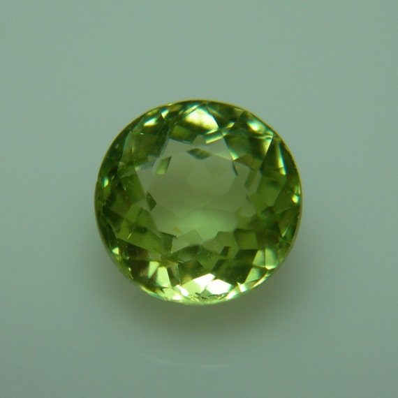 Greenish yellow hotsell gemstone