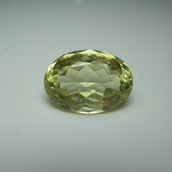 Greenish yellow hotsell gemstone