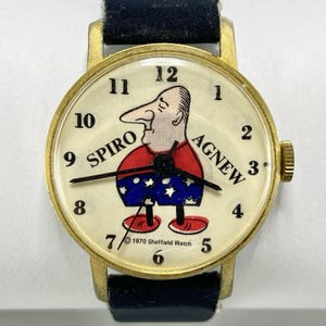 Reloj de pulsera Sheffield Spiro Agnew vintage de 1970, movimiento mecánico, correa azul oscuro. imagen 4