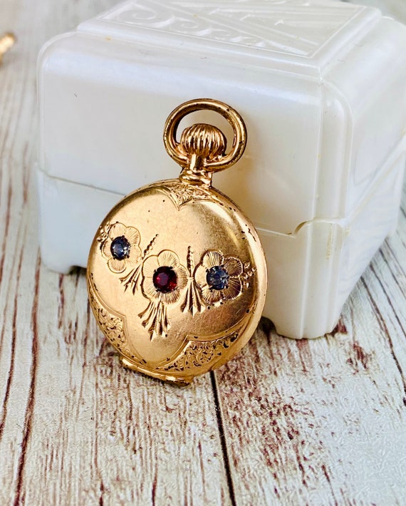 Ladies watch pendant and Gem