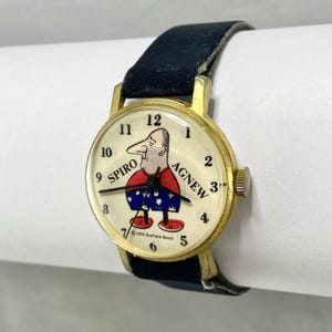 Reloj de pulsera Sheffield Spiro Agnew vintage de 1970, movimiento mecánico, correa azul oscuro. imagen 3