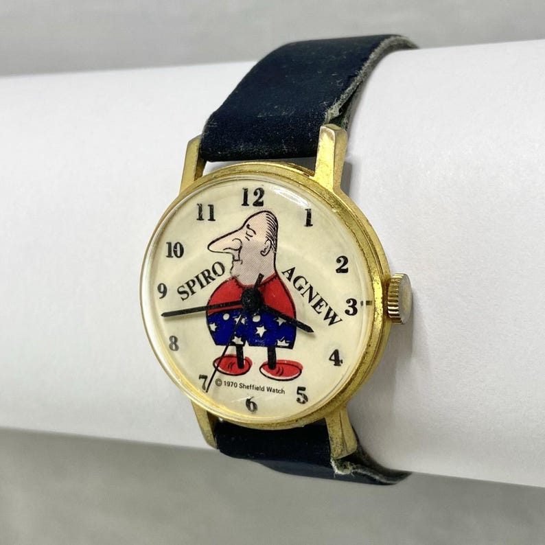 Reloj de pulsera Sheffield Spiro Agnew vintage de 1970, movimiento mecánico, correa azul oscuro. imagen 3