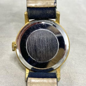 Reloj de pulsera Sheffield Spiro Agnew vintage de 1970, movimiento mecánico, correa azul oscuro. imagen 9