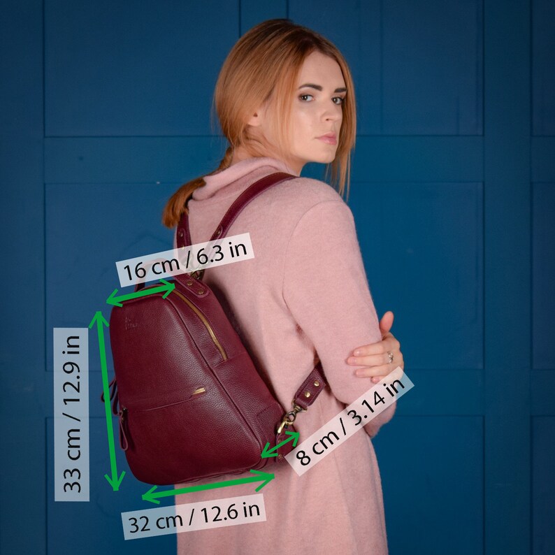 Textured leather rucksack in triangle shape Black mini backpack purse with zipper Small leather backpack for women
