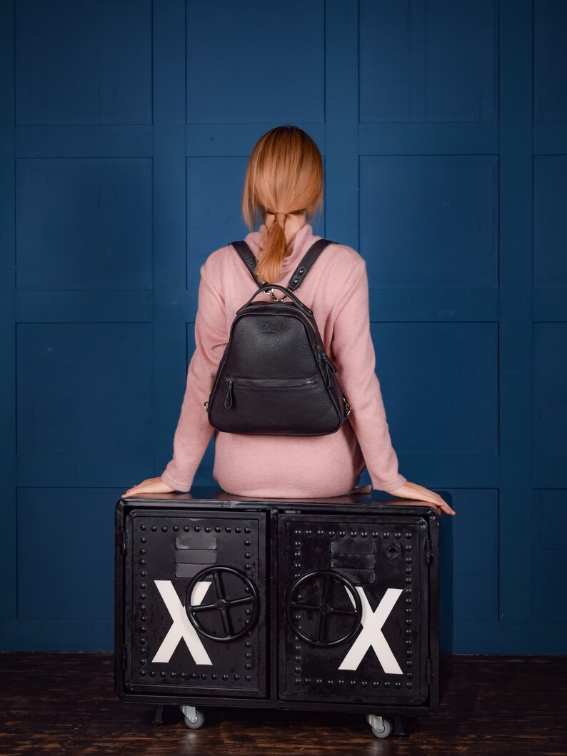 Textured leather rucksack in triangle shape Black mini backpack purse with zipper Small leather backpack for women