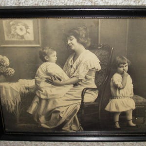 Vintage Sepia Family Portrait in Rustic Wooden Frame