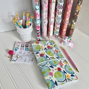 Paperdori, journal, midori, fauxdori travelers notebook cover. Durable laminated double-sided print paper with eyelets and elastic