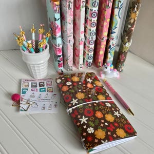 Paperdori, journal, midori, fauxdori travelers notebook cover. Durable laminated double-sided print paper with eyelets and elastic