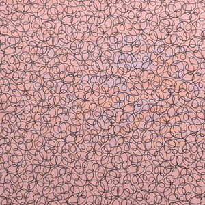 May include: A repeating pattern of black, looping lines covers a light pink background. The lines are of varying sizes and overlap, creating a dense, textured design. The overall effect is a visually complex, abstract pattern.