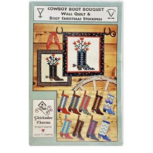 May include: A framed wall quilt and Christmas stocking pattern featuring a cowboy boot bouquet design. The image includes a small wall quilt and several Christmas stocking designs in various colors, with the text "COWBOY BOOT BOUQUET" at the top.