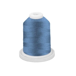 May include: A spool of light blue thread, tightly wound and ready for use. The thread is a solid, medium blue color, and is mounted on a white plastic base. The top of the spool is also white.