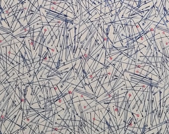 May include: An abstract pattern featuring a dense arrangement of sewing pins. The pins are depicted in dark blue with small red pinheads, scattered across a cream-colored background. The design creates a textured, all-over effect, suitable for fabric or craft projects.