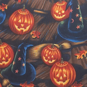 May include: A Halloween-themed pattern featuring orange jack-o'-lanterns with glowing faces, witch hats adorned with stars and moons, and scattered autumn leaves. The background is a dark brown, creating a festive and spooky design.