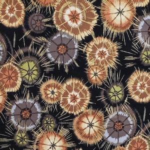 May include: A black fabric with a repeating pattern of brown, gold, and gray stylized flowers. The flowers have a radiating design with a central circle.