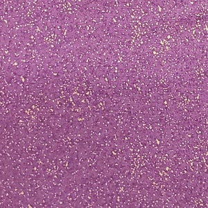 May include: Purple fabric with a speckled pattern of small, light gold flecks.