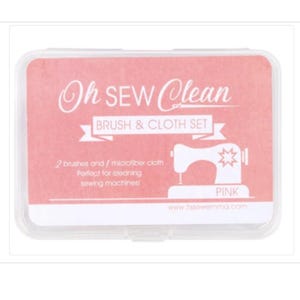 May include: A pink and white sewing machine cleaning kit. The kit includes a brush and cloth set, with the text "Oh SEW Clean" and "Brush & Cloth Set". The kit is designed for cleaning sewing machines.