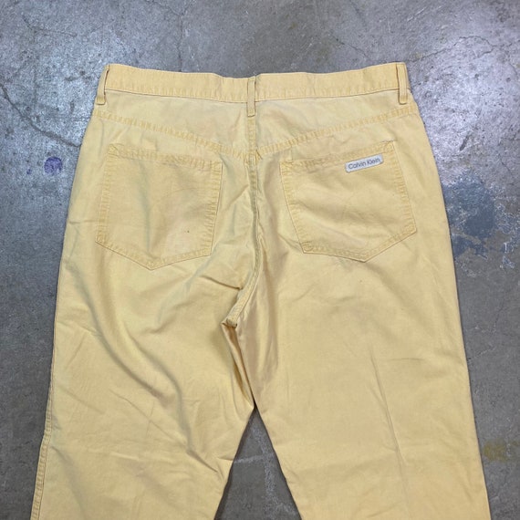 Calvin klein yellow pants sale