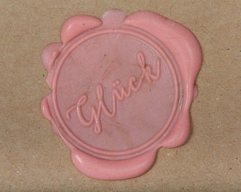 Seal round with lettering luck brass and wood