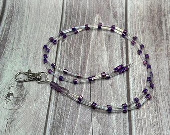 Beverly - Clear lanyard with purple accents & fluorite focal piece.