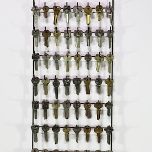 VINTAGE set of assorted blank keys on display rack 240 keys